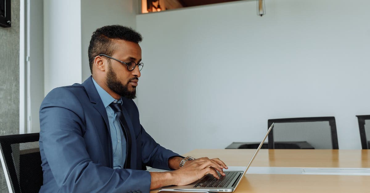 Old and new laptops side by side on a desk