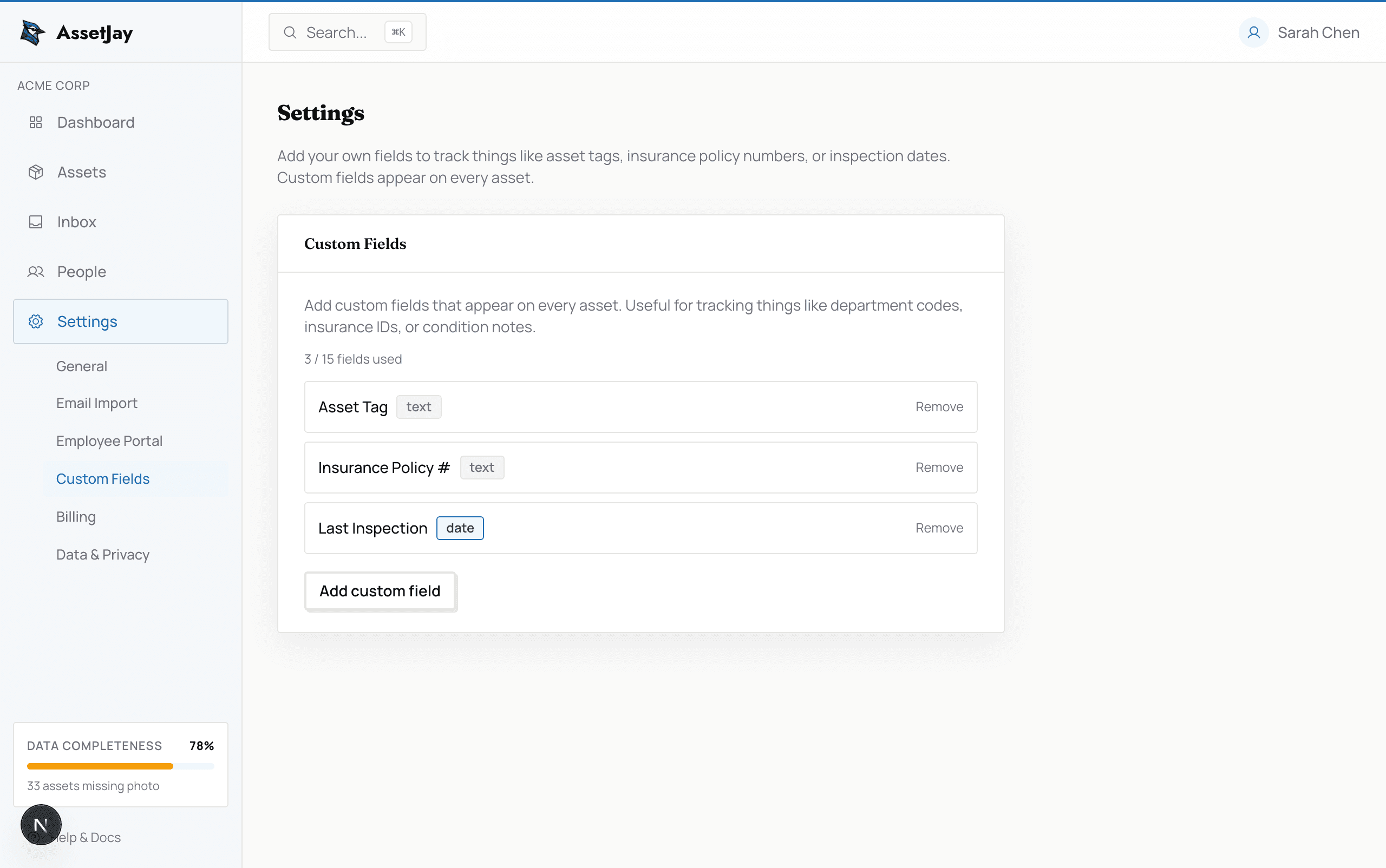 AssetJay custom fields settings page showing three custom fields: Asset Tag (text), Insurance Policy # (text), and Last Inspection (date)
