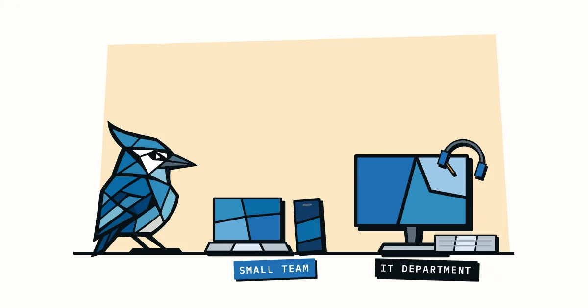 Jay the blue jay beside a laptop and phone labelled small team, next to a monitor, keyboard and headset labelled IT department